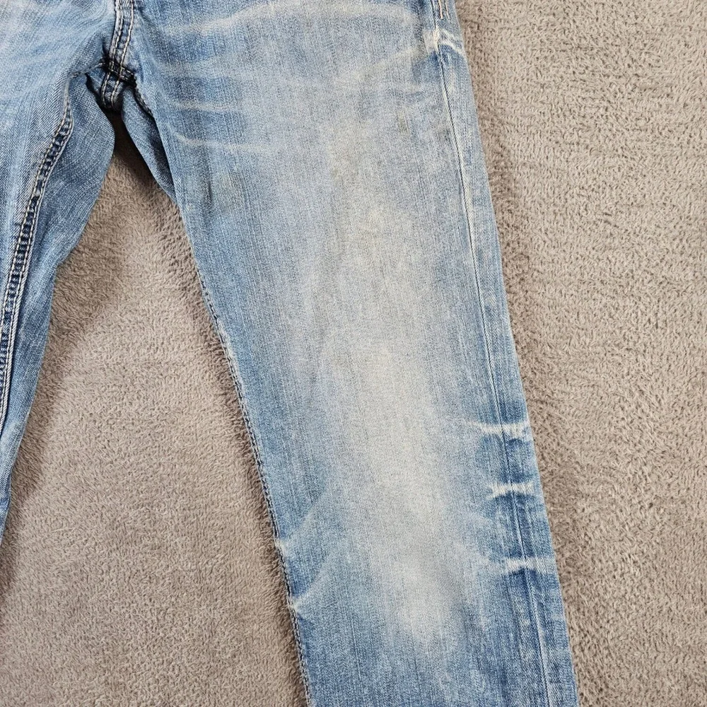 Buckle BKE Jake Bootleg Jeans Mens 29L x 32 Light Wash Distressed Blue Denim